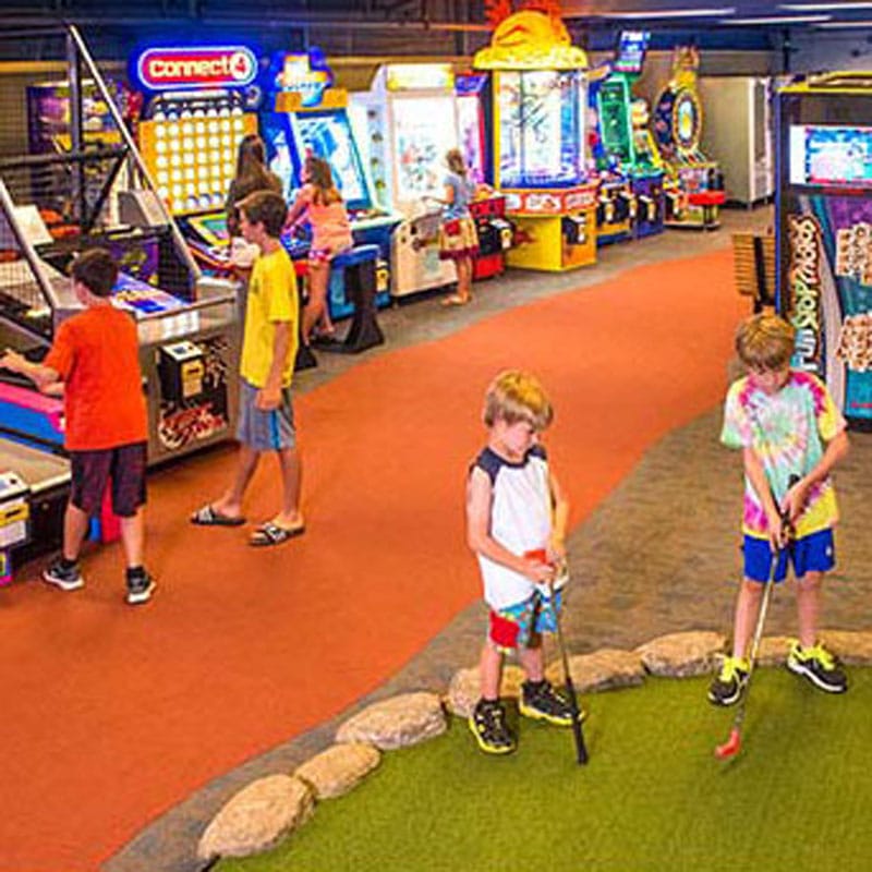 kids playing at the arcade