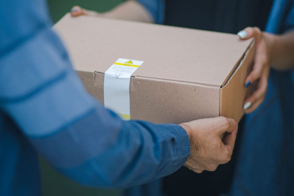 hands exchanging package