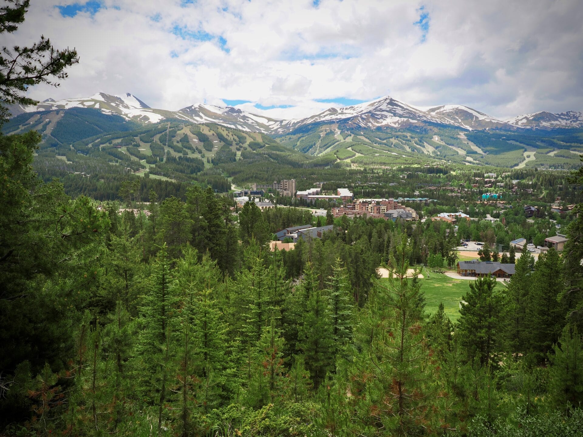 Breckenridge ski area from across the valley in summer with Beaver Run in the foreground