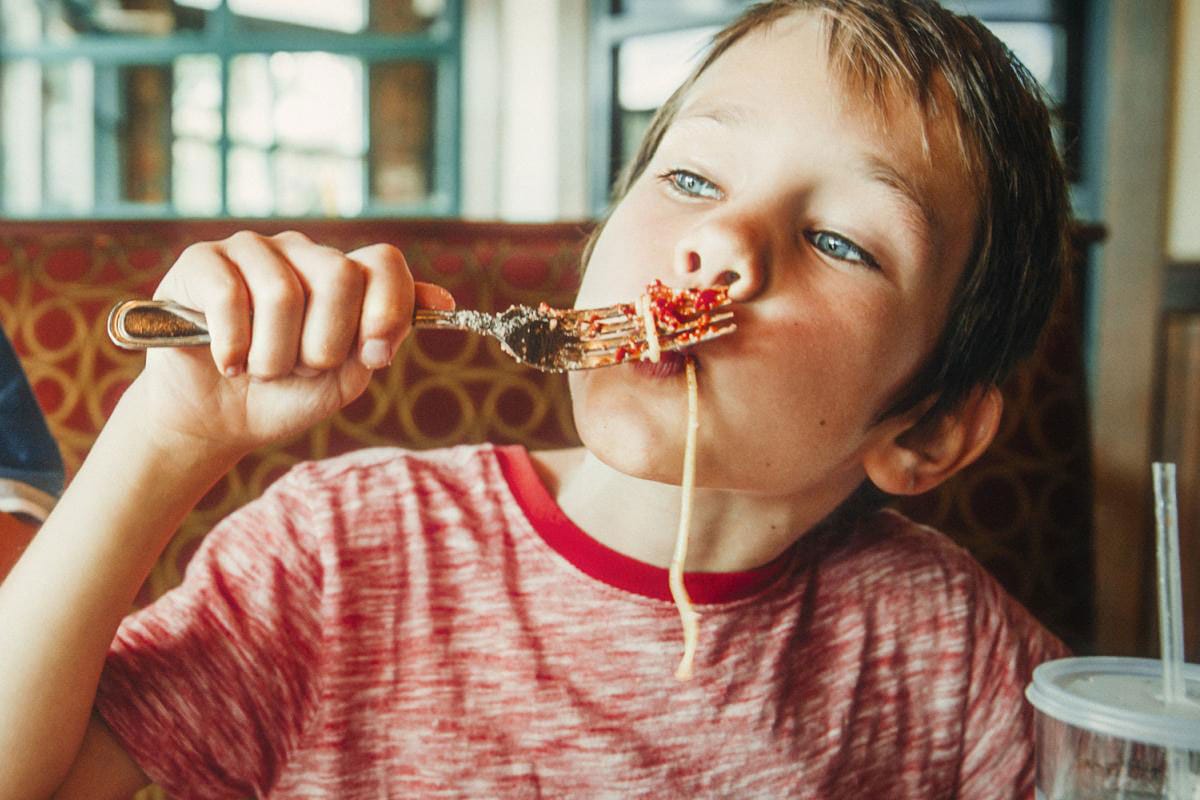 Child eating spaghetti
