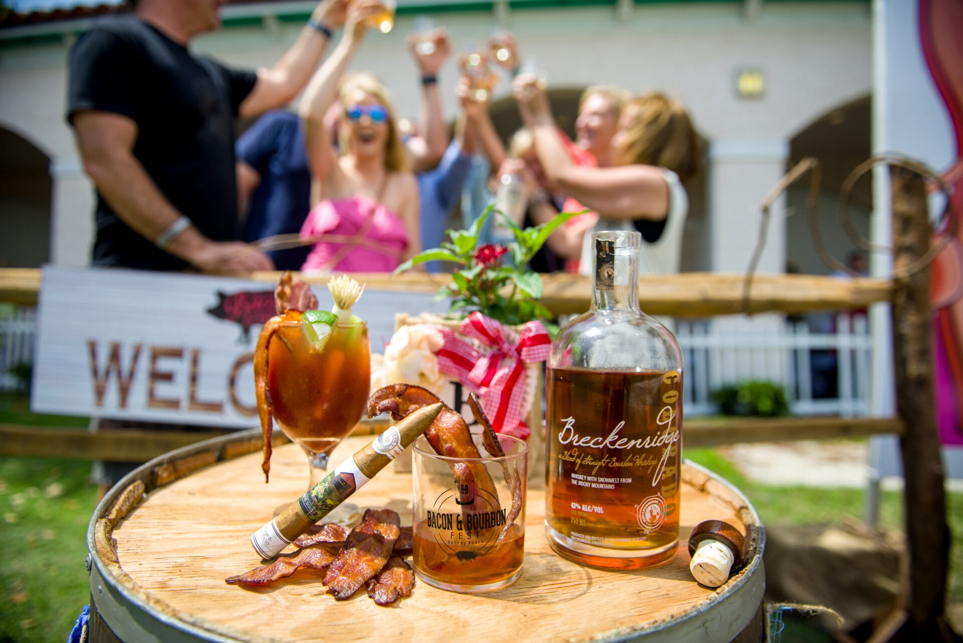 Bourbon bottle with classes for toasting