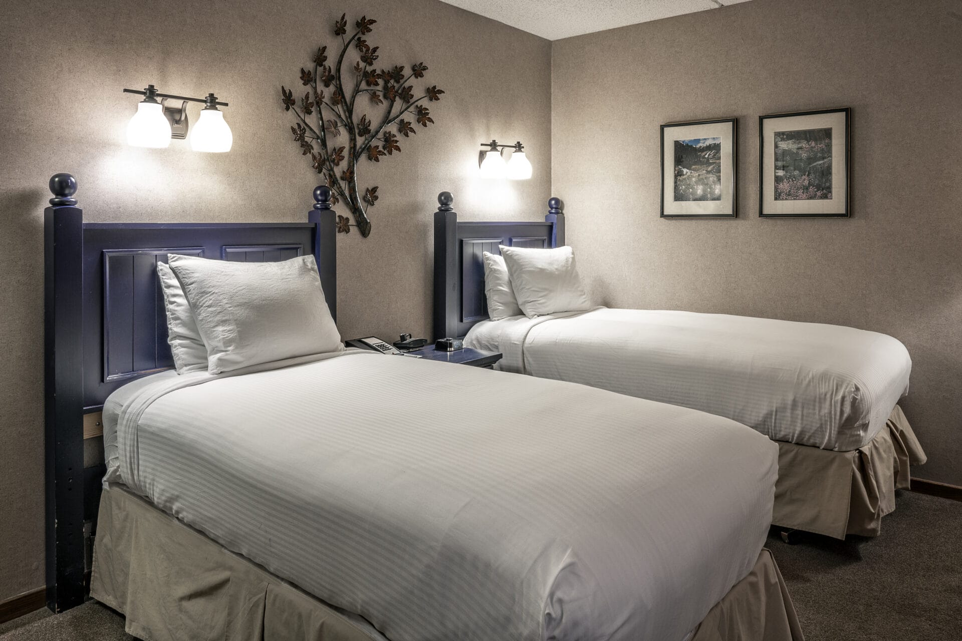 corporate suite bedroom with steel wall decor