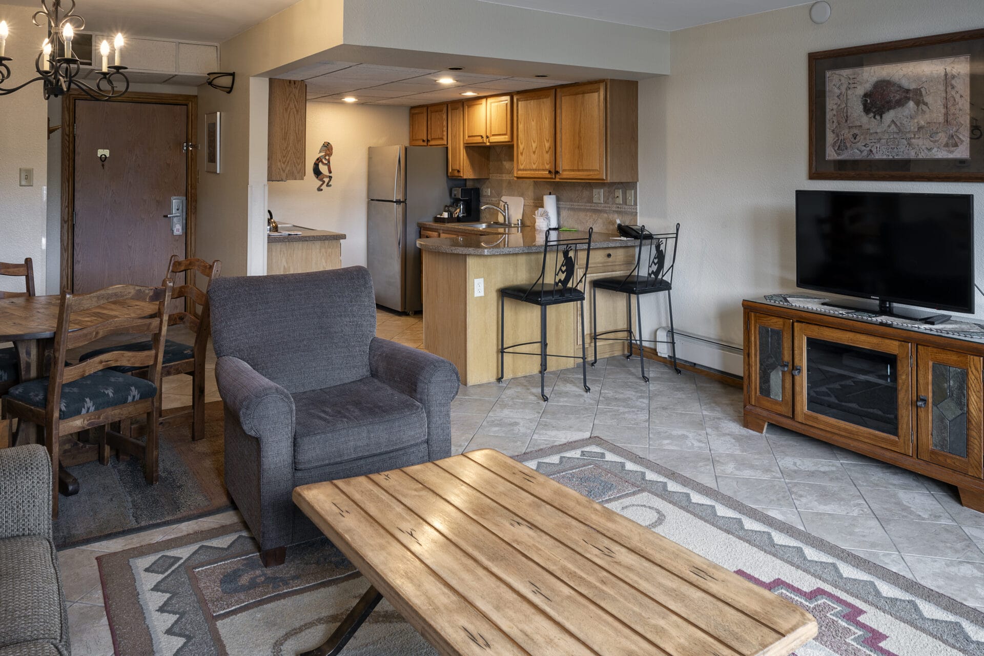 one bedroom condo living room and kitchen