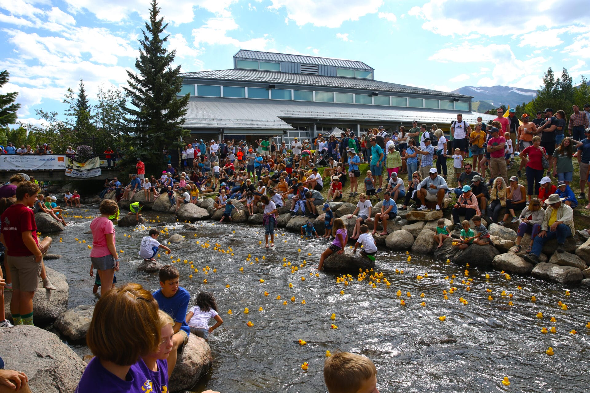 labor day ducky race with the riverwalk center in the background